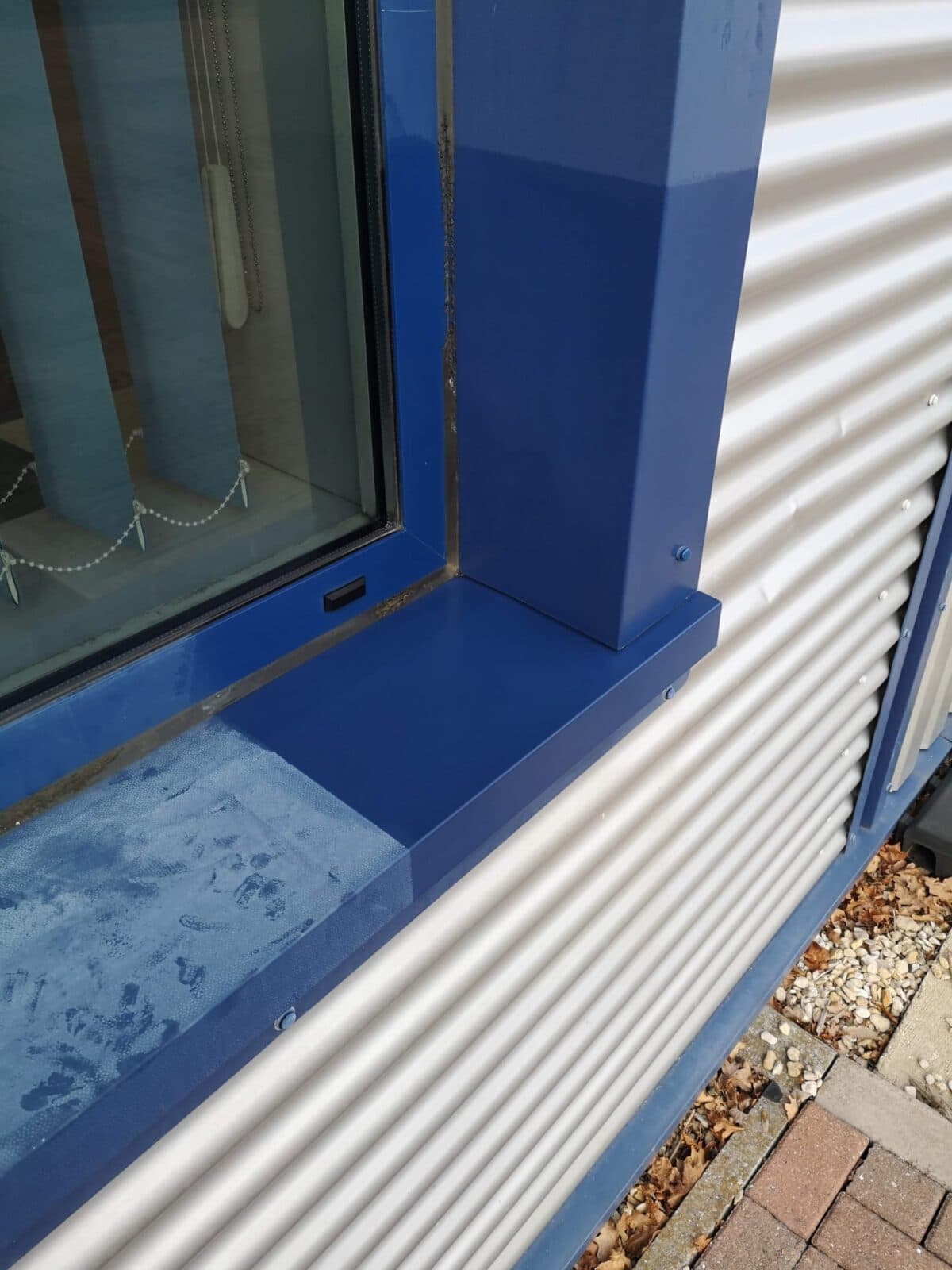 Powder-coated aluminium frame restored to a matched RAL finish. A Star Decorators
