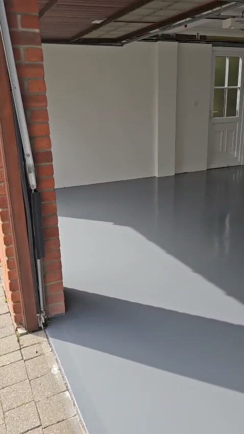 Clean resin garage floor coating after completion